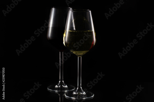 wine glasses on black background. minimalist style