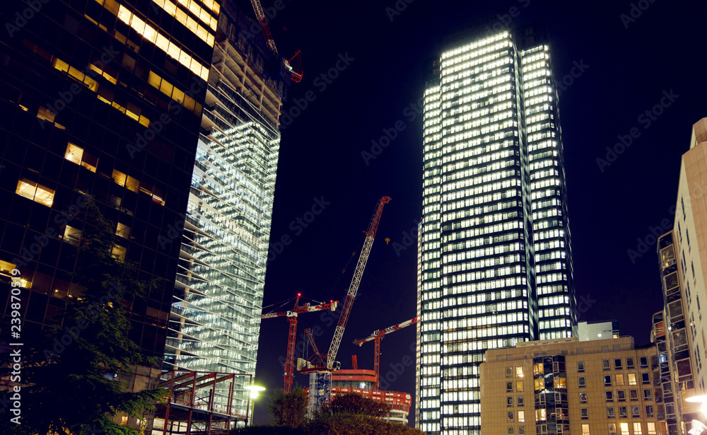 Obraz premium Paris city at night with business buildings