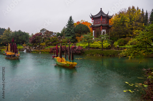 Chinese Garden in the rain, with boats and pagoda, Montreal botannical gardens photo