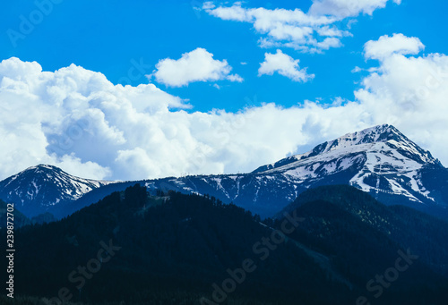 Scenic mountain high peaks with snow.