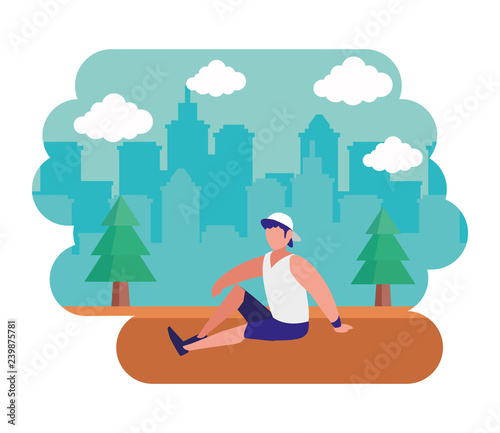 man making yoga in the park city