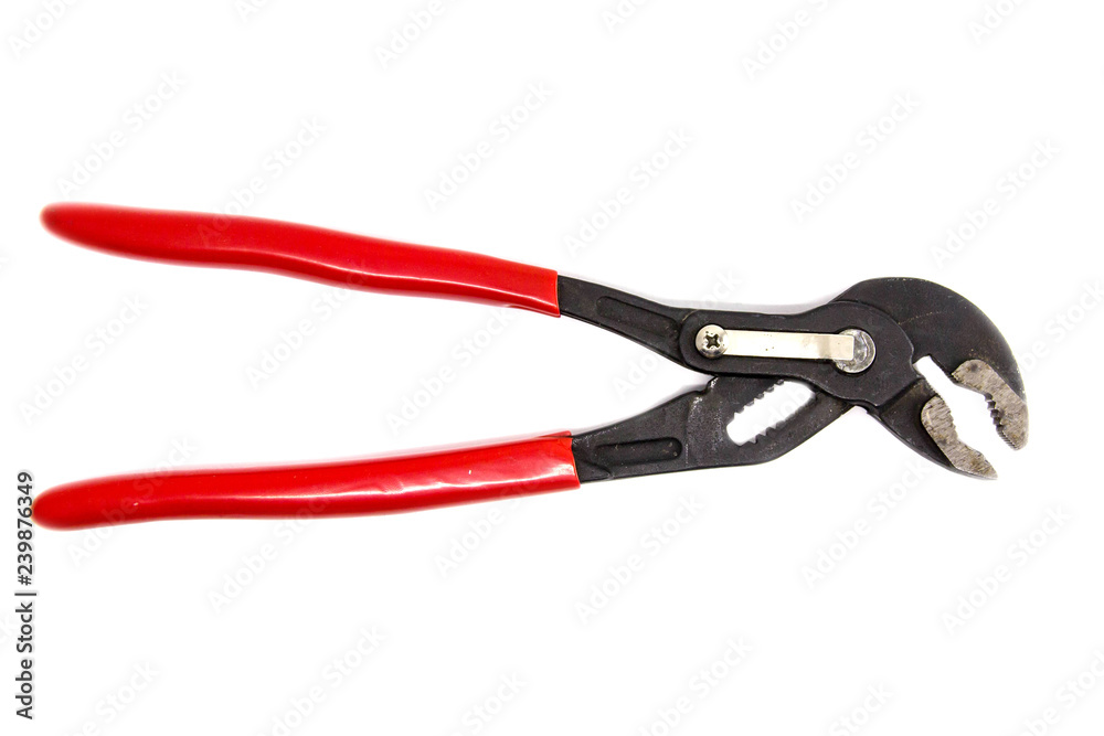 Adjustable water pump pliers tongue and groove isolated on white background. Universal wrench. Professional tool for work. Flat lay, top view Adjustable water pump pliers tongue and groove isolated on white background. Universal wrench. Professional tool for work. Flat lay, top view