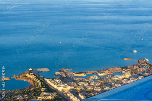 Aerial view on hotels near Hurghada city from the airplane