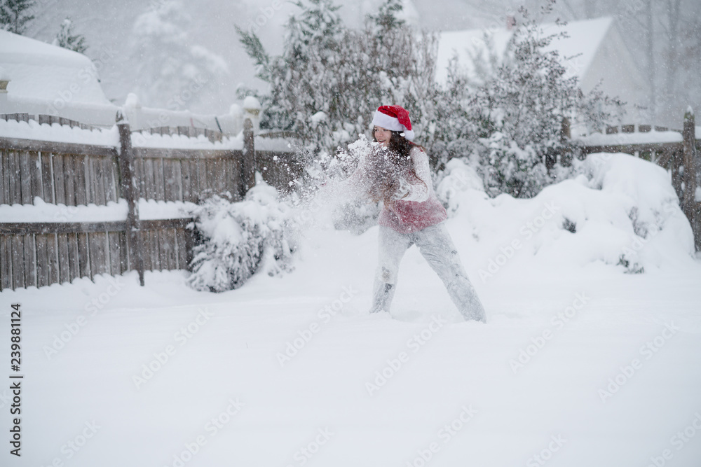 Tween Girl Playing in Snow