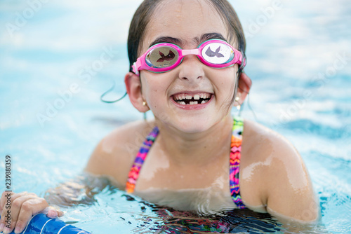 Girl Swimming in Pool © Robin