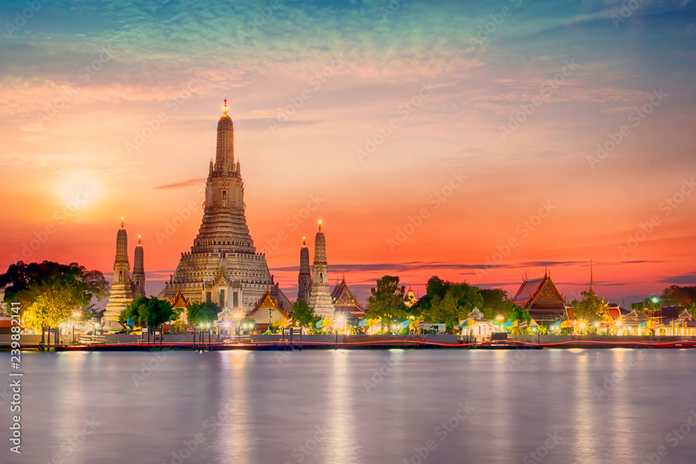 Thai Temple at Chao Phraya River Side, Sunset at Wat Arun Temple in Bangkok Thailand. Wat Arun is a Buddhist temple in Thon Buri District of Bangkok, Thailand, Wat Arun is among the best known of Thai