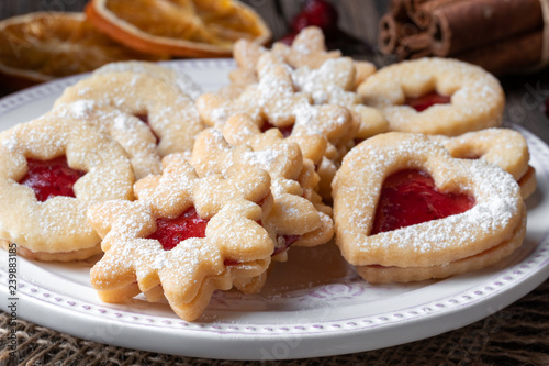 Traditional Linzer Christmas cookies arranged on a plate