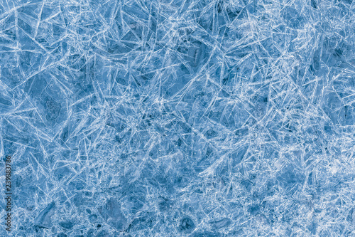 A lot of sharp blue icicles as a background or backdrop