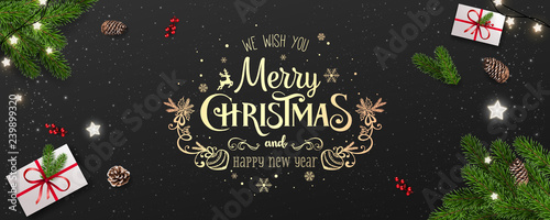 Gold Merry Christmas Typographical on black background with tree branches, berries, gift boxes, stars, pine cones. Xmas and New Year theme. Vector Illustration