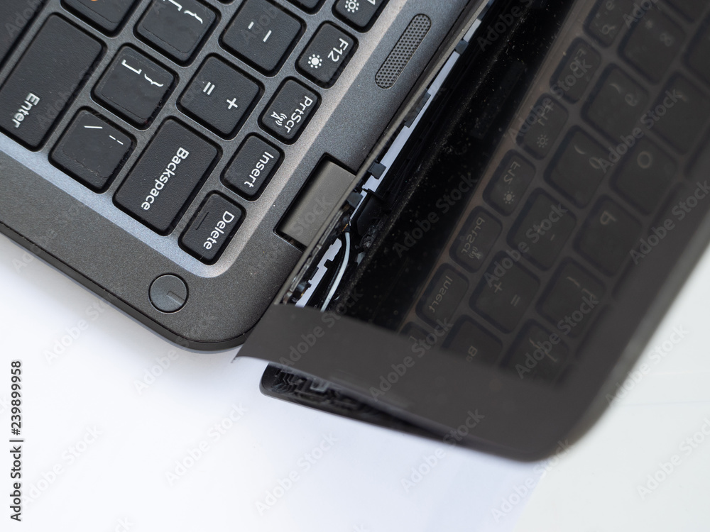 broken laptop screen cover, top down view broken laptop screen cover, top down view