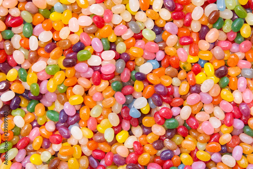 Bright, Festive And Colorful Background Or Texture Of Jelly Beans. Cheerful Mix Of Multiсolored Candies. Children's Holiday Concept. Top View.