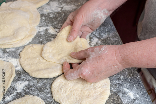 Preparing the pastry to make small cakes photo