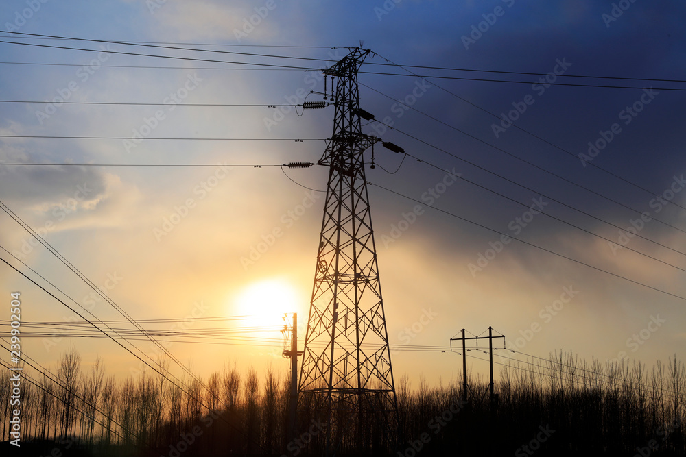 electric tower in the setting sun