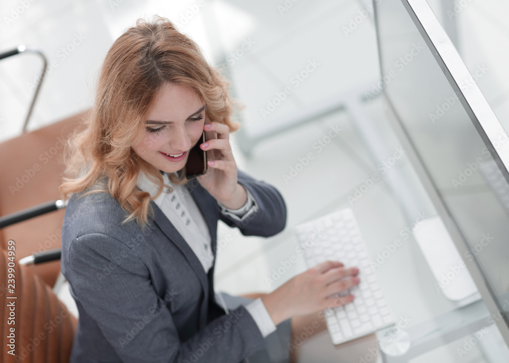 closeup. business woman talking on smartphone closeup. business woman talking on smartphone