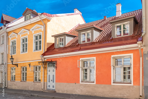  Tallinn in Estonia, colorful houses in the medieval city, typical buildings 