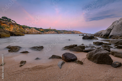 Sunrise at Capo Testa Lighthouse and beach located at the northernmost point of Sardinia on the western entrance to the Strait of Bonifacio
