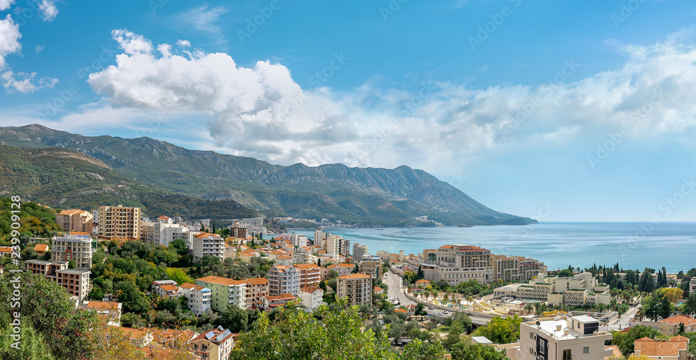 Panoramic view of city, mountains and bay with beauty sky and clouds, Montenegro.