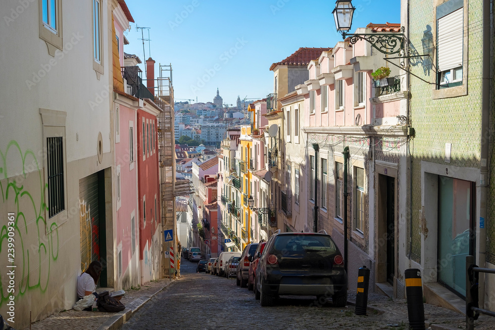 LISBON, PORTUGAL - OCTOBER 01, 2018: Old Lisbon street in a beautiful summer day