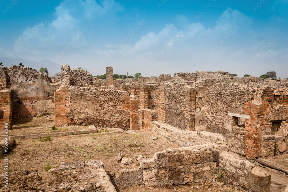 Pompeii ruins: remains of ancient houses at archaeological site