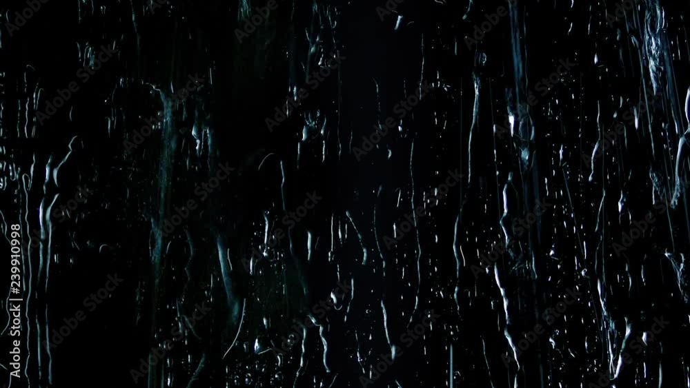 Rain Hits Surface On Black