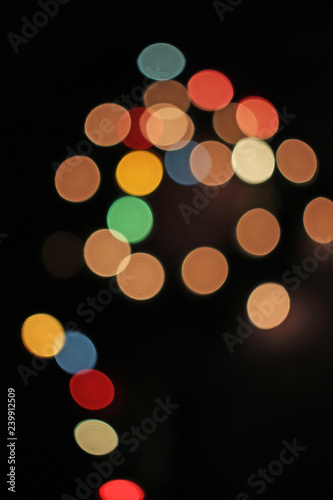 Blurred defocused christmas light lights bokeh background. Colorful red yello...