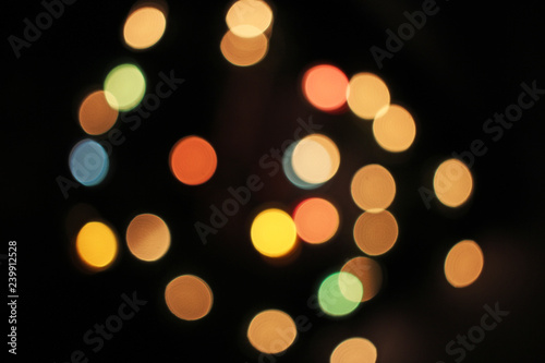 Blurred defocused christmas light lights bokeh background. Colorful red yello...
