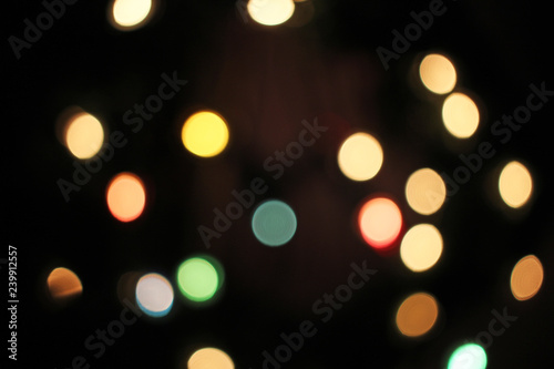 Blurred defocused christmas light lights bokeh background. Colorful red yello...