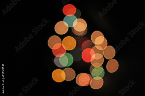 Blurred defocused christmas light lights bokeh background. Colorful red yello...