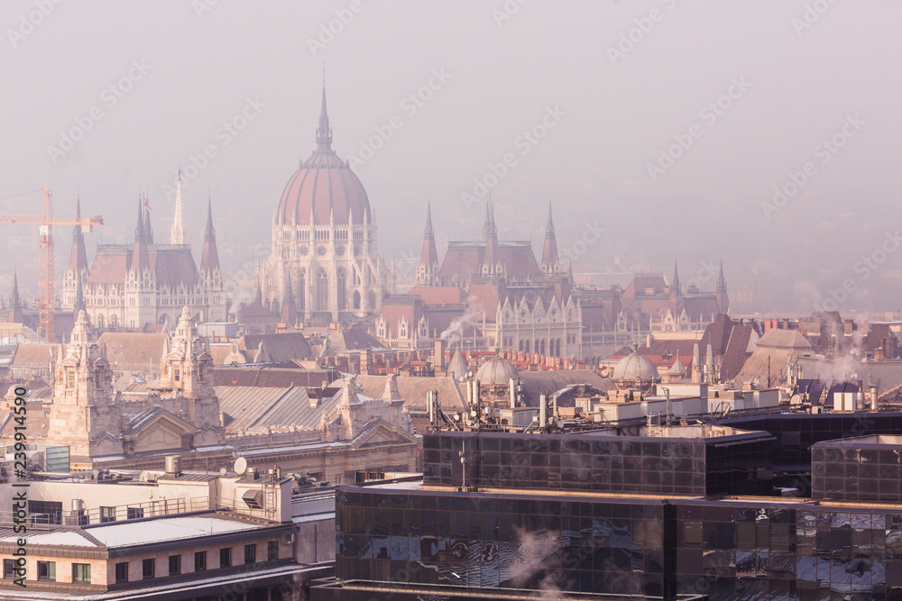 View of Budapest from St. Stephens Basilica on Hungarian Parliament on a snowy foggy day, Budapest, Hungary
