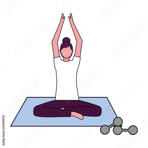 woman making yoga with mat and dumbbells