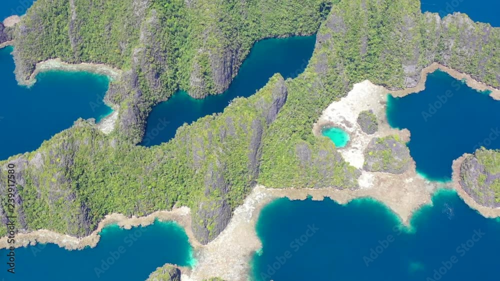 Aerial View of Remote and Rugged Limestone Islands in Raja Ampat Aerial View of Remote and Rugged Limestone Islands in Raja Ampat