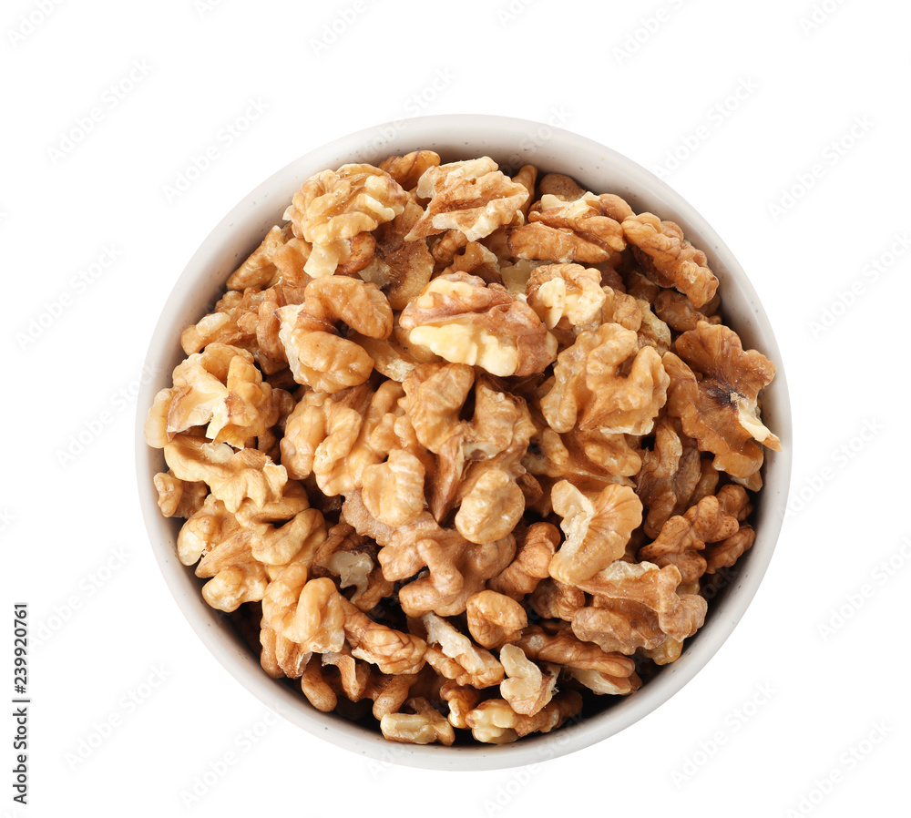Bowl with walnuts on white background, top view Bowl with walnuts on white background, top view
