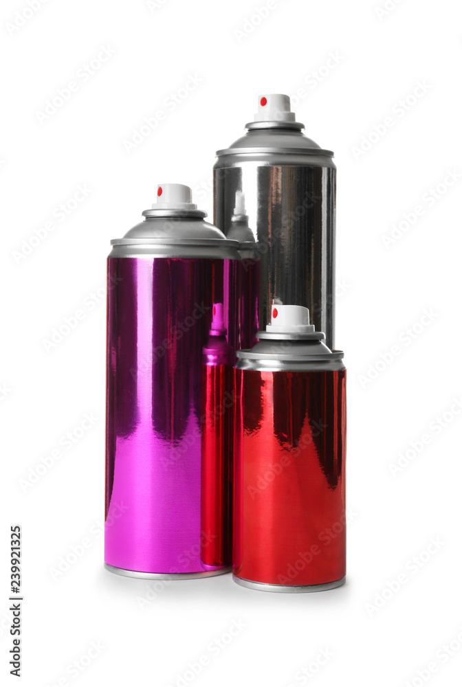 Different cans of spray paints on white background Different cans of spray paints on white background
