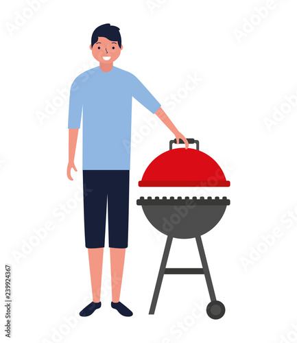 young man barbecue equipment
