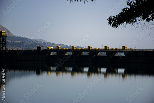 Photograph of the wall of a dam in India photo