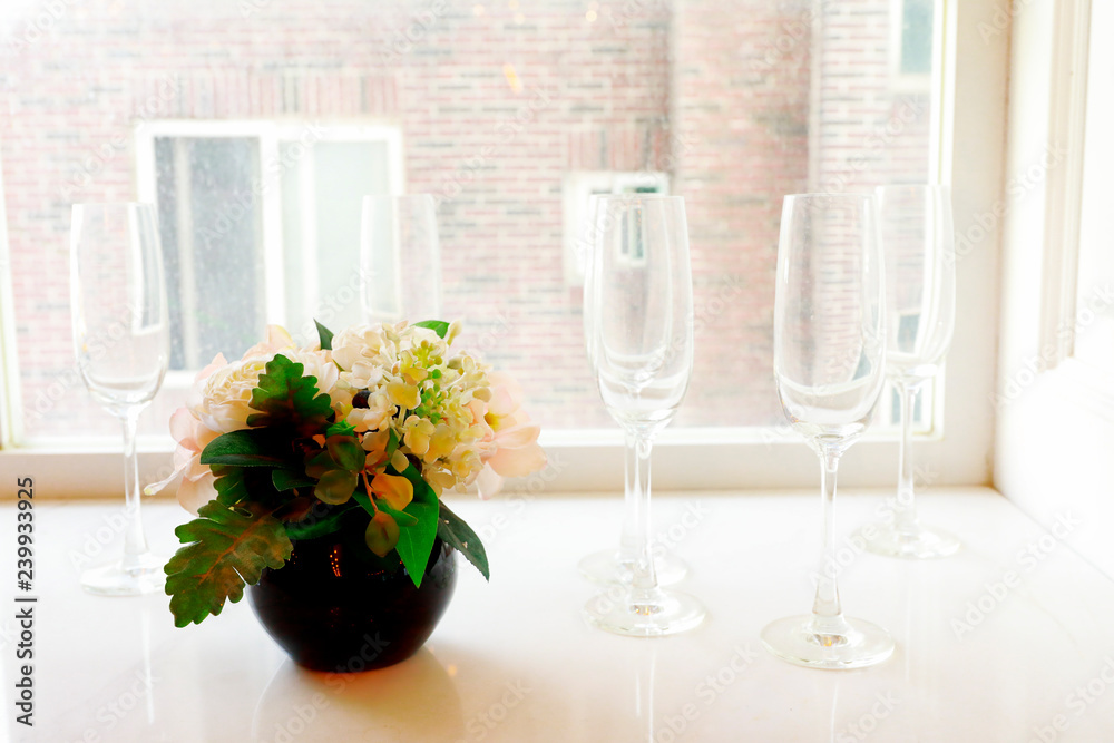 flower vases beside the window in the morning