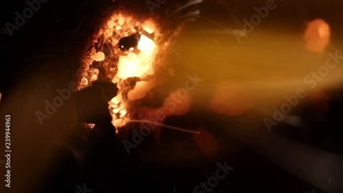 Bright fiery flashes and sparks. Burning steel wool. Abstract flame background.