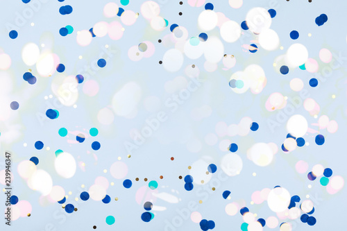 Fotografia, Obraz Blue background with gold and dark blue confetti