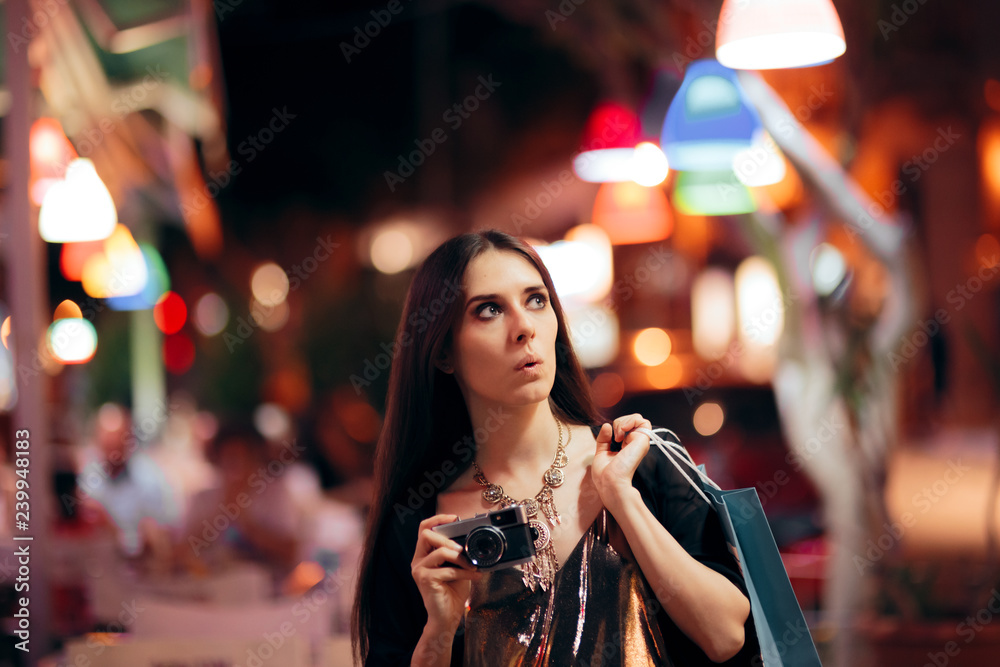Happy Tourist Shopping in the Evening in the City Happy Tourist Shopping in the Evening in the City