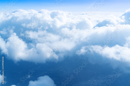 blue skyline and cloudscape, view of the airplane window