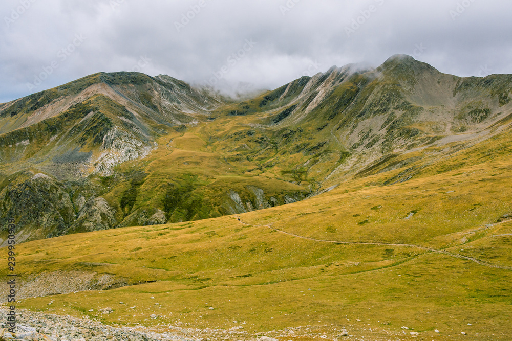 Hiking on a cloudy day in the mountains.