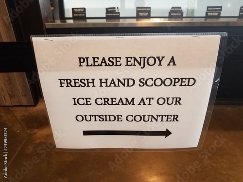 please enjoy a fresh hand scooped ice cream at our outside counter sign