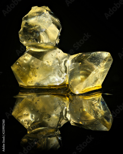 Cannabis concentrate diamonds isolated on black background
