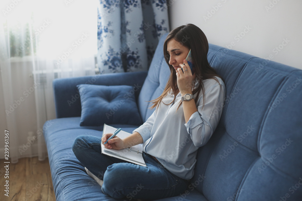 Cute caucasian girl talking on phone in real room Cute caucasian girl talking on phone in real room