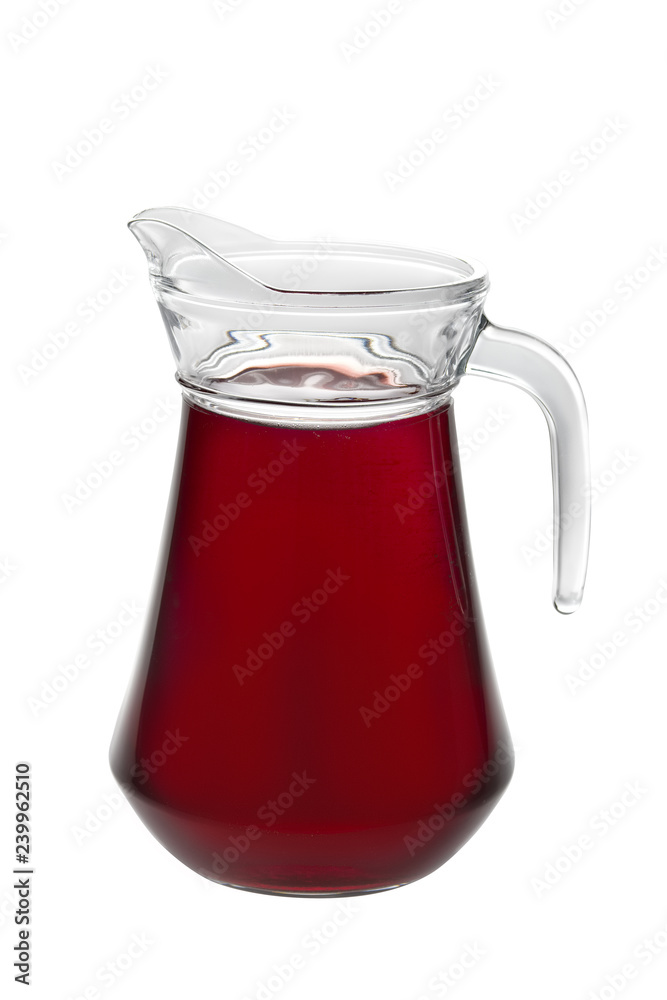 Big pitcher with plum juice isolated on white background Big pitcher with plum juice isolated on white background