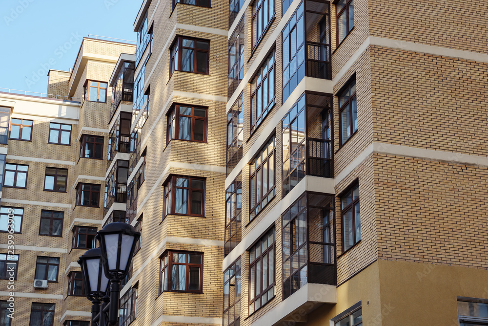 Modern condominium building real etate in city with blue sky