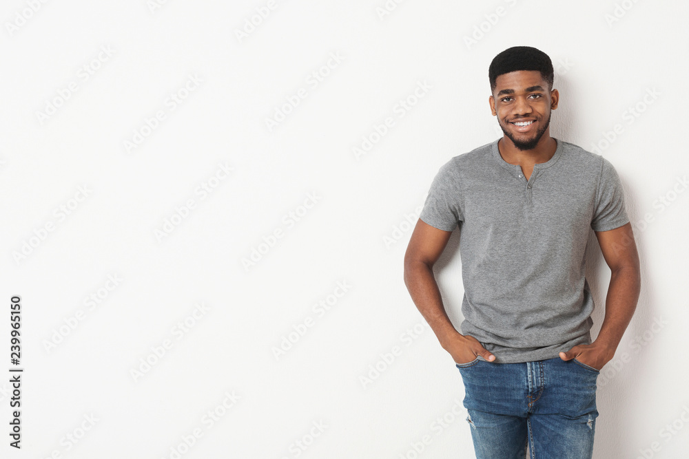 Black casual man with his hands in his pockets Black casual man with his hands in his pockets