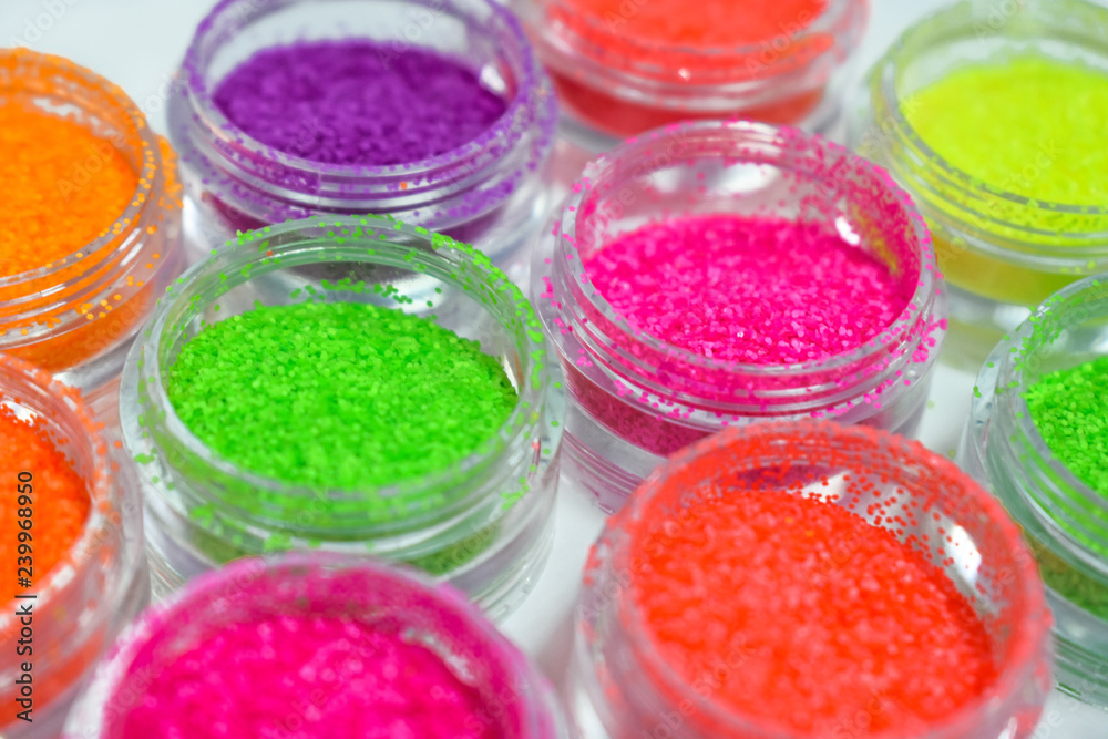 colourful pigments for decoration, manicure, makeup. Beautiful bright background. Decorative elements. beauty products