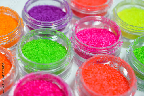 colourful pigments for decoration, manicure, makeup. Beautiful bright background. Decorative elements. beauty products