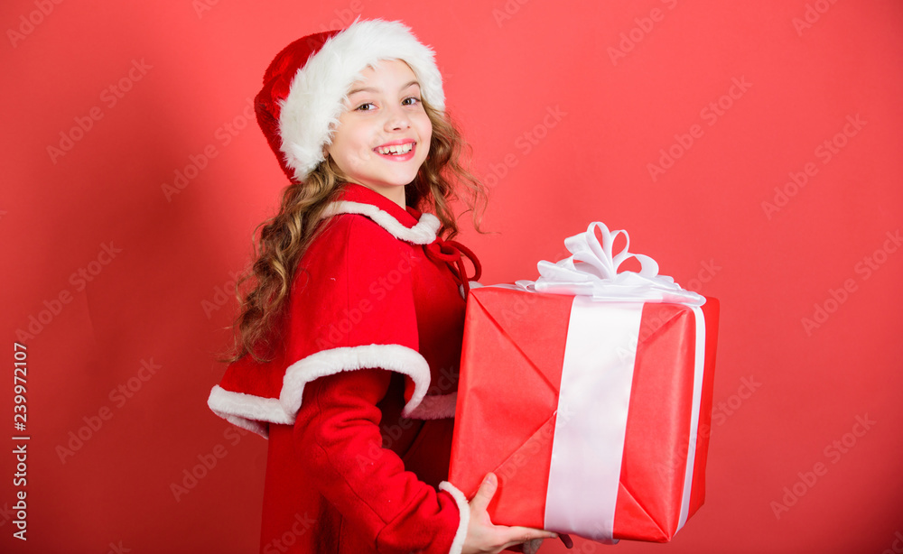 Unpacking christmas gift. Winter holiday tradition. Opening christmas gift. Kid happy with christmas present. Dreams come true. Girl celebrate christmas open gift box. Happy new year concept Unpacking christmas gift. Winter holiday tradition. Opening christmas gift. Kid happy with christmas present. Dreams come true. Girl celebrate christmas open gift box. Happy new year concept